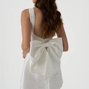Elegant White Dress with Bow Detail